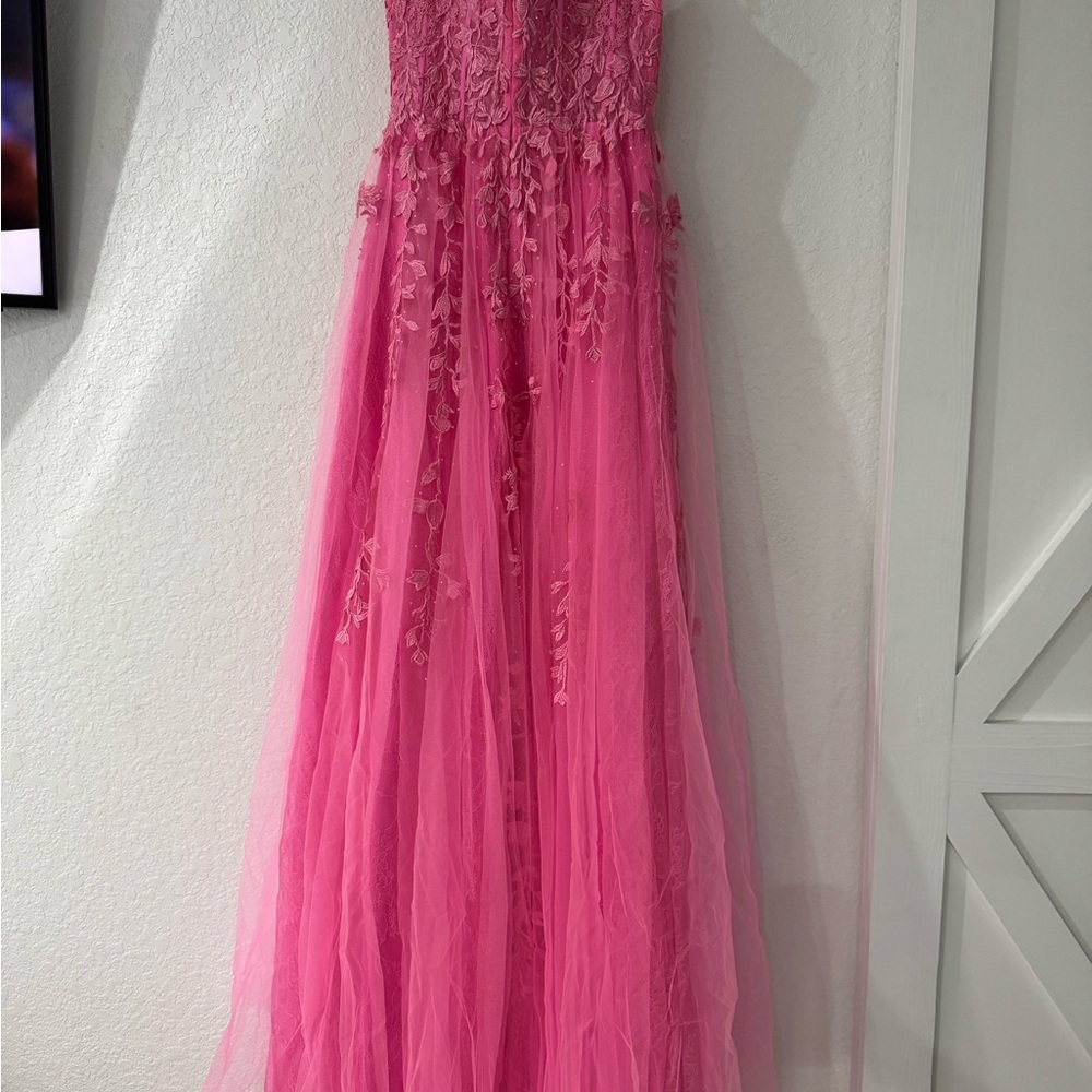 Elegant Pink Gown with Floral Details